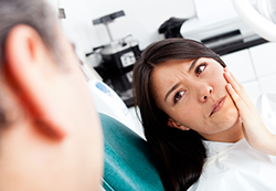 Woman at dentist with toothache, Emergency Dentist West Orange, NJ