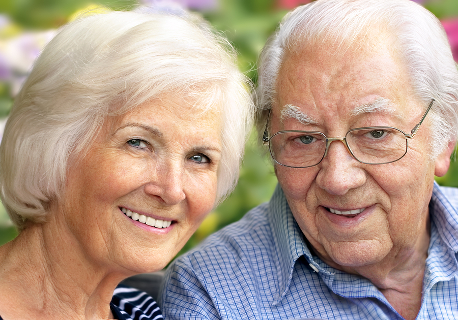 old woman and old man outdoors smiling nice teeth, dentures Marlboro, NJ