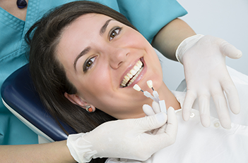 woman smiling getting teeth whitened at dentist, Beaver Dam, WI teeth whitening