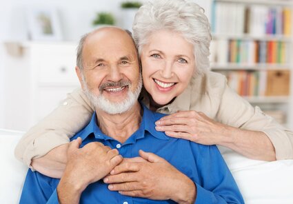 older couple smiling with nice dentures, general dentist Old Bridge, NJ